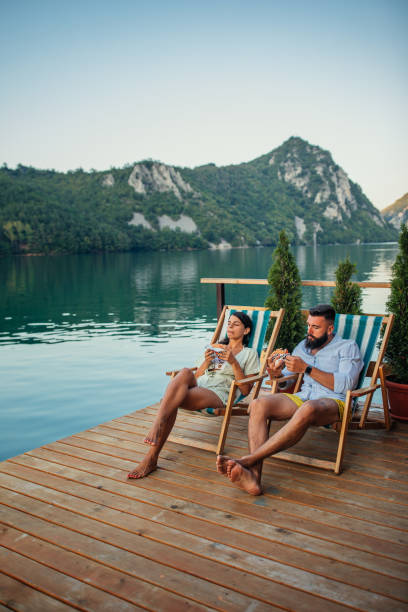 istock Lovely couple having lunch in beautiful natural environment 1320525242