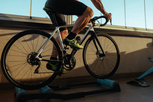 istock Senior man on exercise bike 1320525356