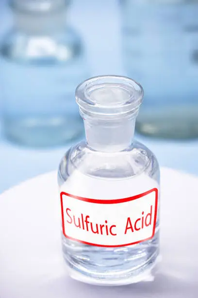 Photo of Reagent bottle with description: Sulfuric acid. a mineral acid composed of the elements sulfur, oxygen and hydrogen with the molecular formula H