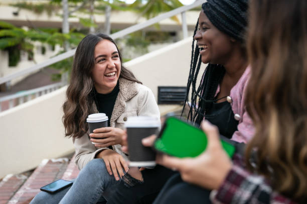 istock Young adults socializing on campus 1320527884