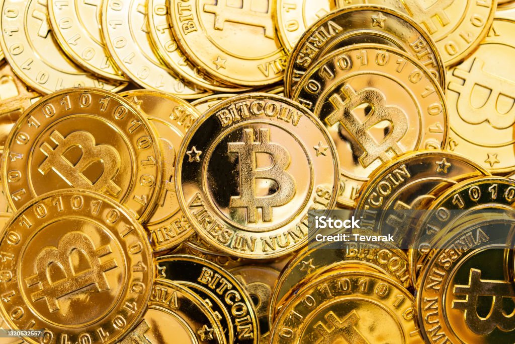 Bitcoin cryptocurrency background. A bunch of golden bitcoin, Digital currency Bitcoin Stock Photo