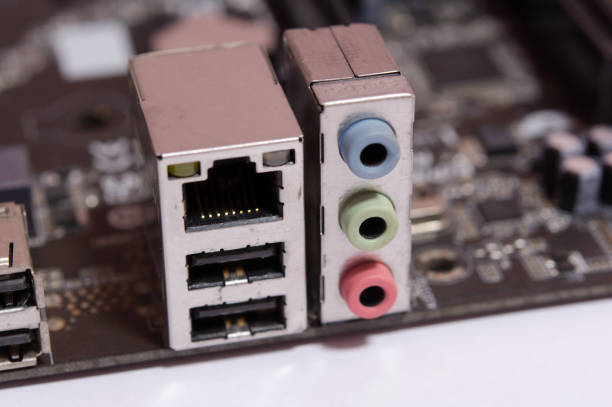 istock Lan socket RJ 45 and Audio output socket on computer motherboard isolated on white background 1320533336