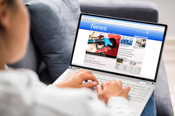 istock Watching News On Laptop Computer Screen Online 1320534436
