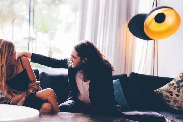 istock Couple flirting in the hotel lobby 1320534528