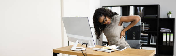 istock African Back Pain At Work Desk 1320536526