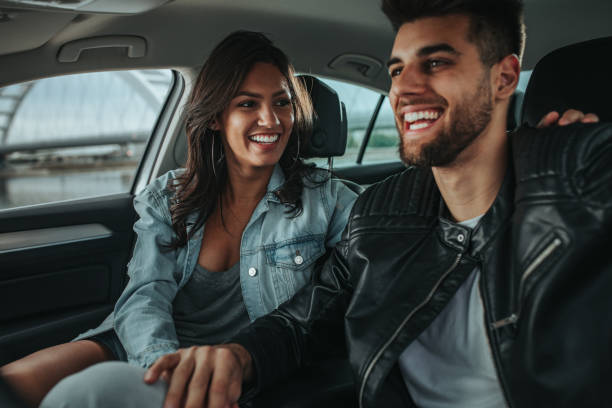 istock An affectionate young couple enjoying a road trip 1320539026