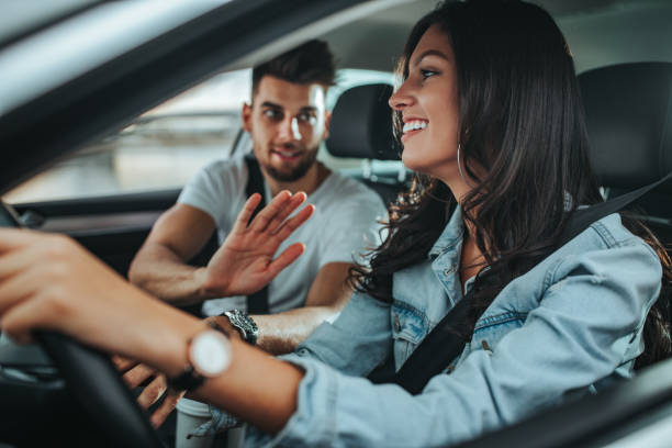 istock An affectionate young couple enjoying a road-trip 1320539055
