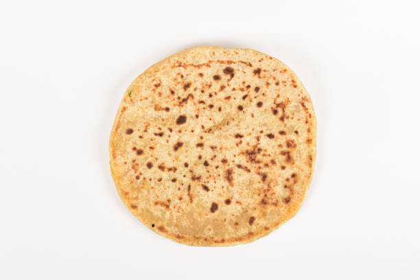 istock Top View Of Paratha Isolated On White Background With Clipping Path, Aloo Paratha 1320541254