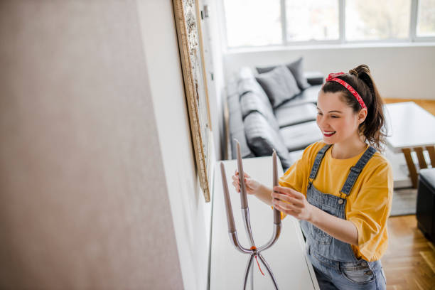 istock Inspired female professional designer decorator make individual home style in modern flat for clients customers. Happy young woman studio apartment buyer create living room interior 1320542425