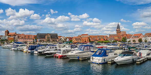 Panoramic picture of the harbour of Waren on the Müritz with the old town in the background.