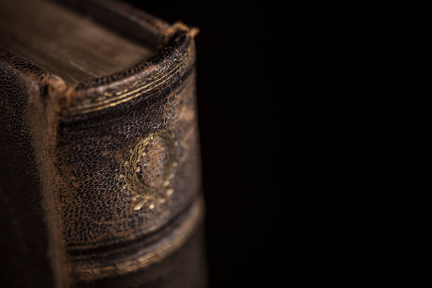 Yellowed and bent pages of an old book
