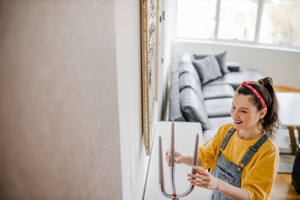 istock Inspired female professional designer decorator make individual home style in modern flat for clients customers. Happy young woman studio apartment buyer create living room interior 1320547491