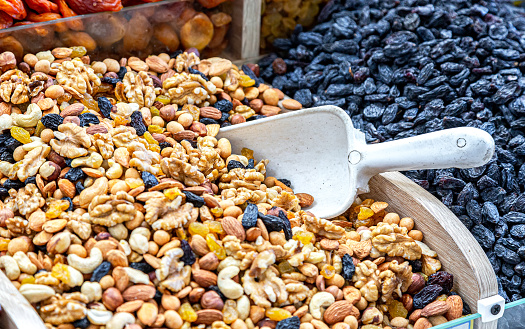 Various nuts and dried fruits are sold at the market