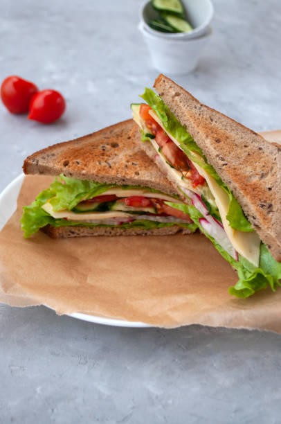 istock Freshly cooked rye bread sandwich with delicious vegetables. 1320548524