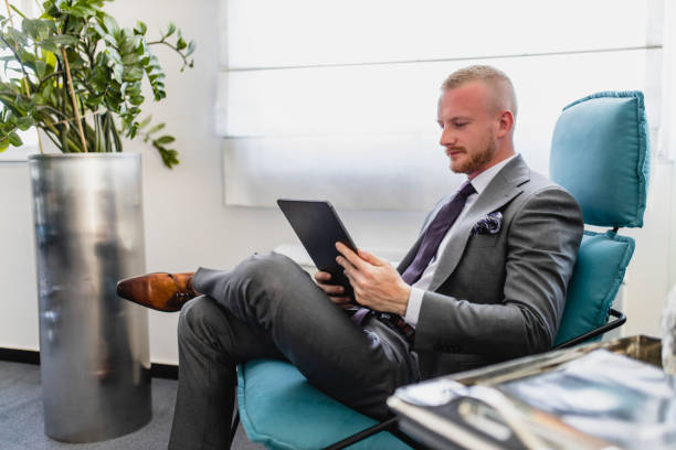 istock Businessman having video meeting in his modern office 1320549431