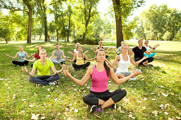 istock yoga in park 132054962