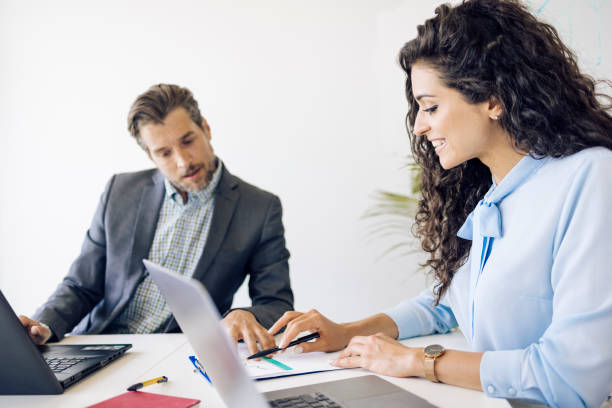 istock Two entrepreneurs are working together on a new project 1320555369