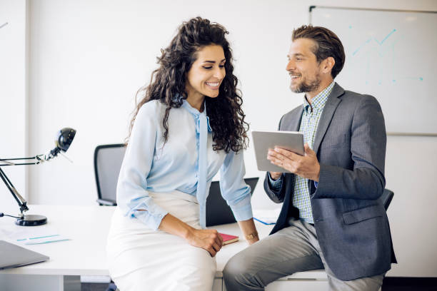 istock Two business people talking about a new job 1320555394