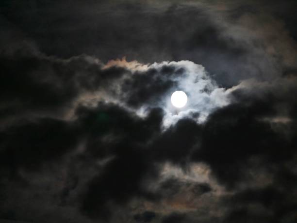 istock Full moon shines in the night sky 1320563154
