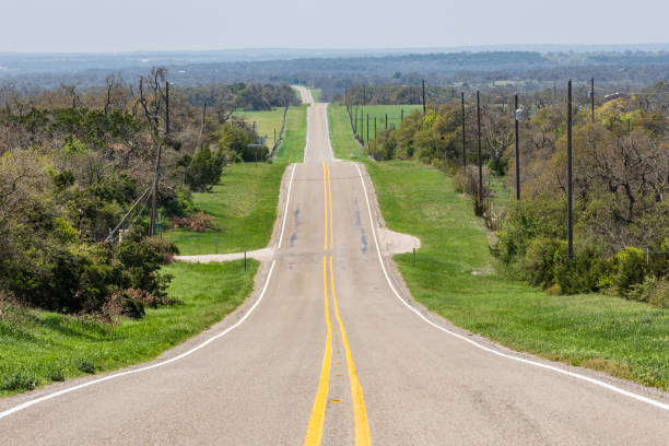 istock An empty country road in the Texas hill country 1320563321