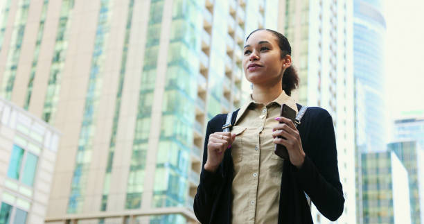 istock Young mixed race adult student urban  portrait strongly confident expression 1320564259