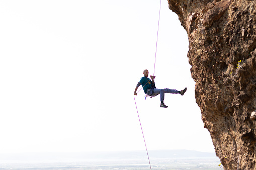 Rappelling from Cliff.