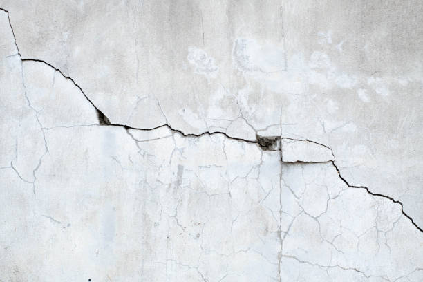 istock Old Concrete wall is broken and black and white color,cement background 1320572962
