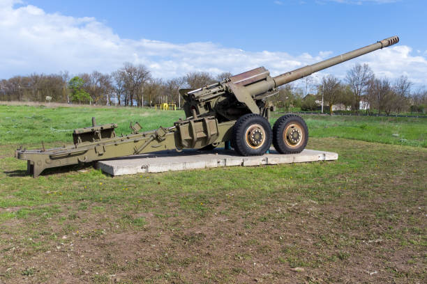 istock A large green cannon from the Second World War at the open-air memorial complex. Artillery gun. 1320574816