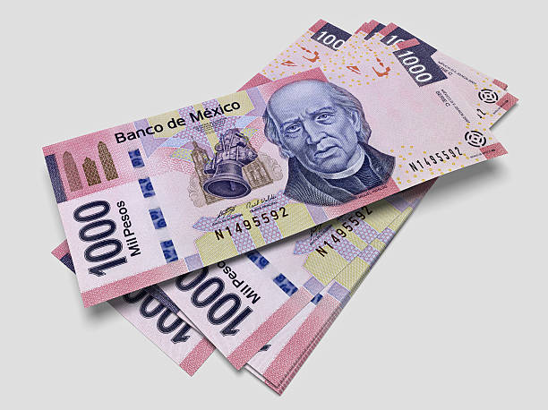 Some bills of one thousand Mexican pesos 3D render of one thousand pesos bills with sharp focus. number 1000 stock pictures, royalty-free photos & images