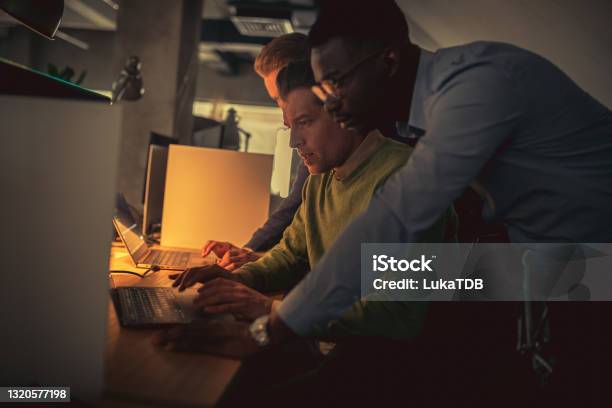 Problem Solvers Stock Photo - Download Image Now - Debugging, Coding, Computer