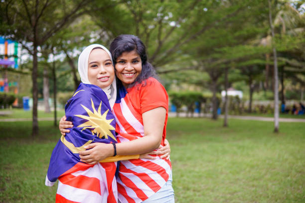 istock Malaysian women celebrating independence day. 1320587498