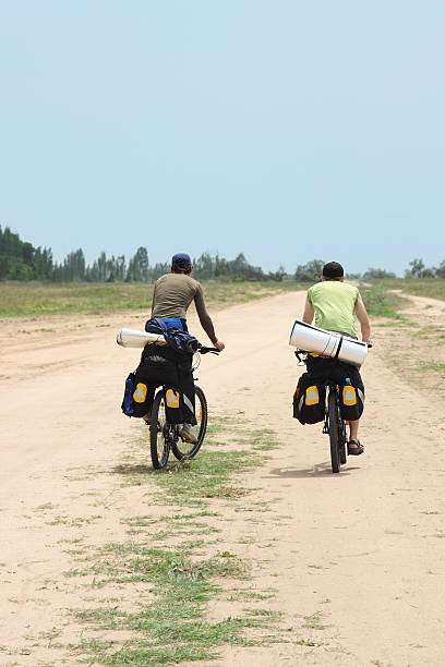 istock two tourists in bicycle journey, view from back 132059147