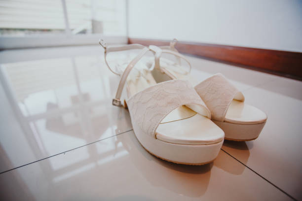 istock wedding concept. bride's shoes and veil 1320597200