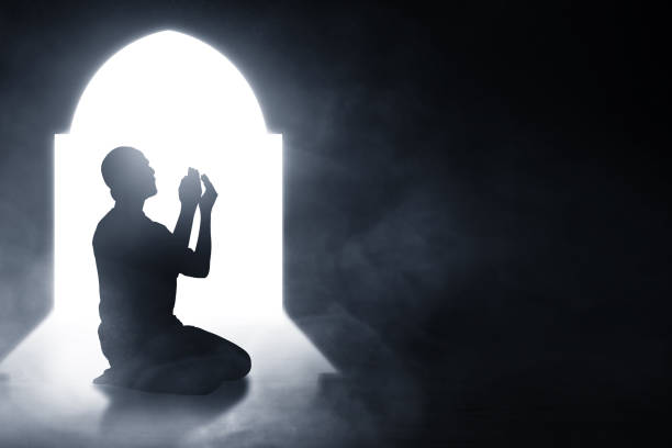 istock Silhouette of muslim man praying 1320598306