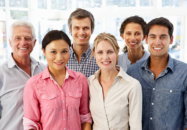 istock Mixed group of business people in office 132060090