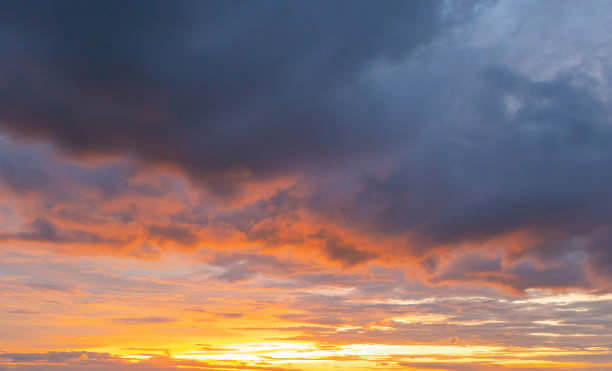 istock Sunset sky. Abstract nature background. Dramatic blue with orange colorful clouds in twilight time. 1320603424