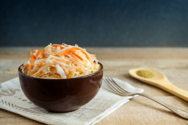 istock Sauerkraut with carrots in a ceramic Cup. 1320605267