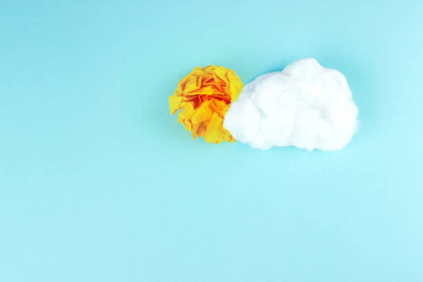 istock Shining sun concept with crumpled paper ball and cloud. Idea Concept Background 1320610517