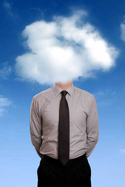 istock Man in business suit has his head covered by clouds 132061239