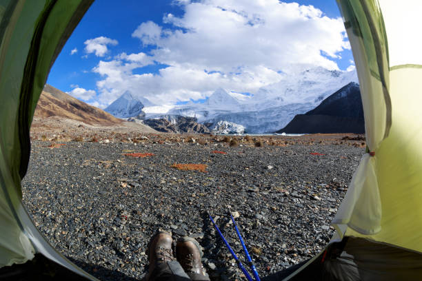 istock Hiker enjoy the beautiful landscape in tent 1320613692