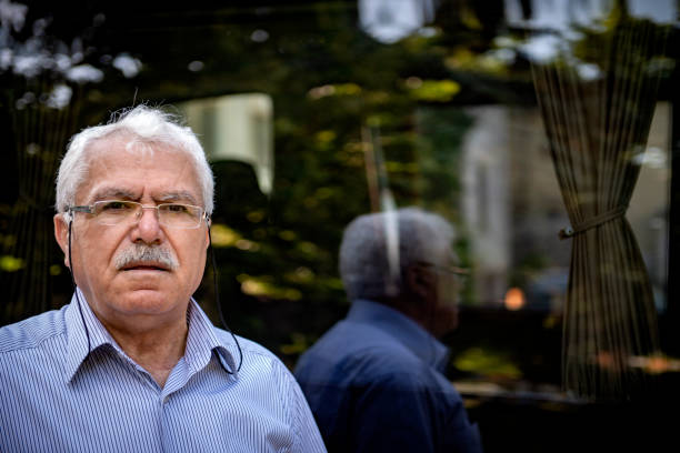istock Portrait of Turkish man with reflection in the window 1320622826