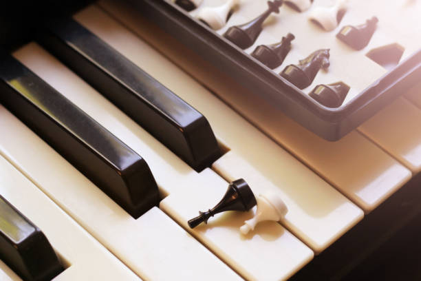 istock Chess and piano keys so close 1320622880