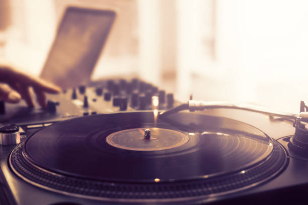 istock Old vinyl spinning on turntable, retro style 1320625639