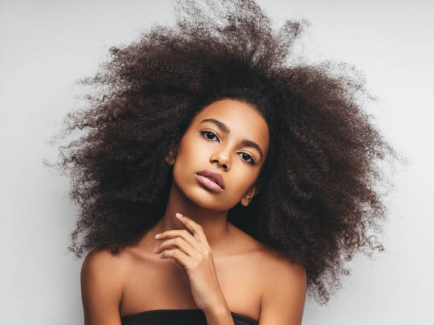 istock Beautiful girl with curly hairstyle 1320627582