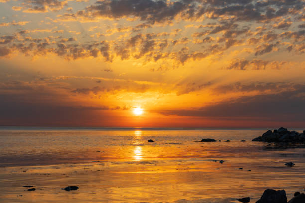 istock Sunrise over the sea and beautiful cloudscape in Anapa 1320627710