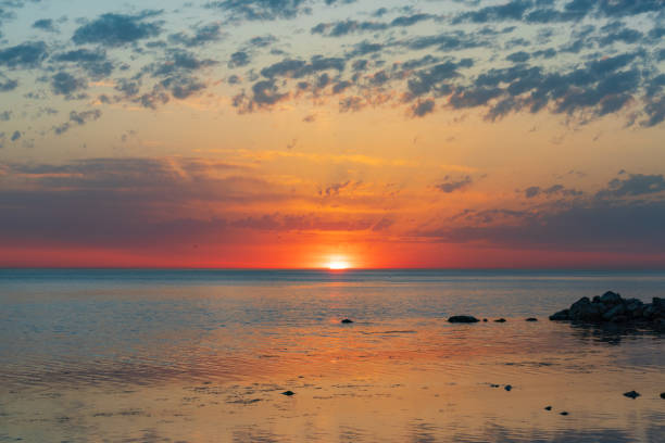istock Sunrise over the sea and beautiful cloudscape in Anapa 1320627733