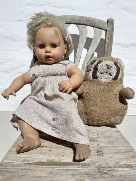 istock My old toy doll and my teddy bear 1320628528