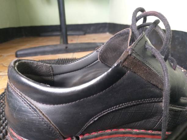 istock shoes that are placed on the floor 1320629363