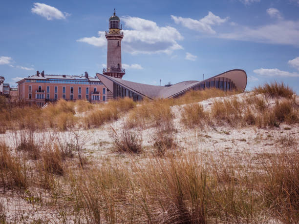 istock Dune landscape with the lighthouse of Warnemuende 1320633864
