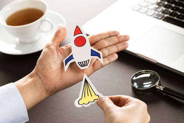 istock Business Person with Startup Rocket 1320639076